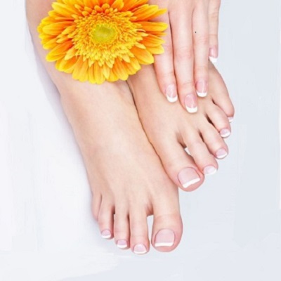 female feet at spa salon on pedicure and manicure procedure female feet at spa salon on pedicure and manicure procedure
